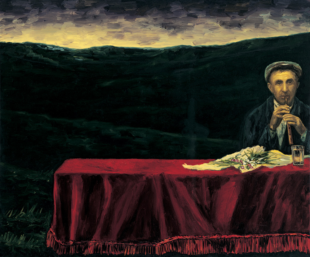 man sitting by red table in nature twilight