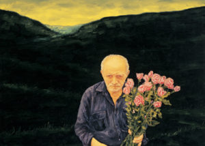 man holding flowers in nature twilight